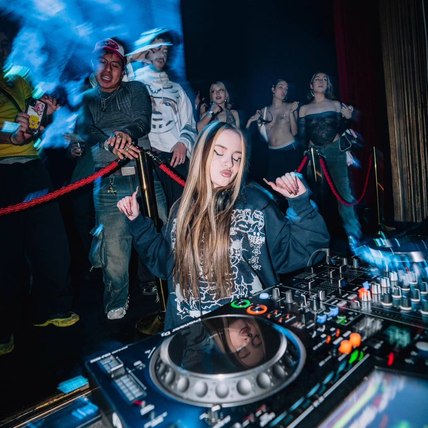 Carl0ta wearing KISORE behind the decks