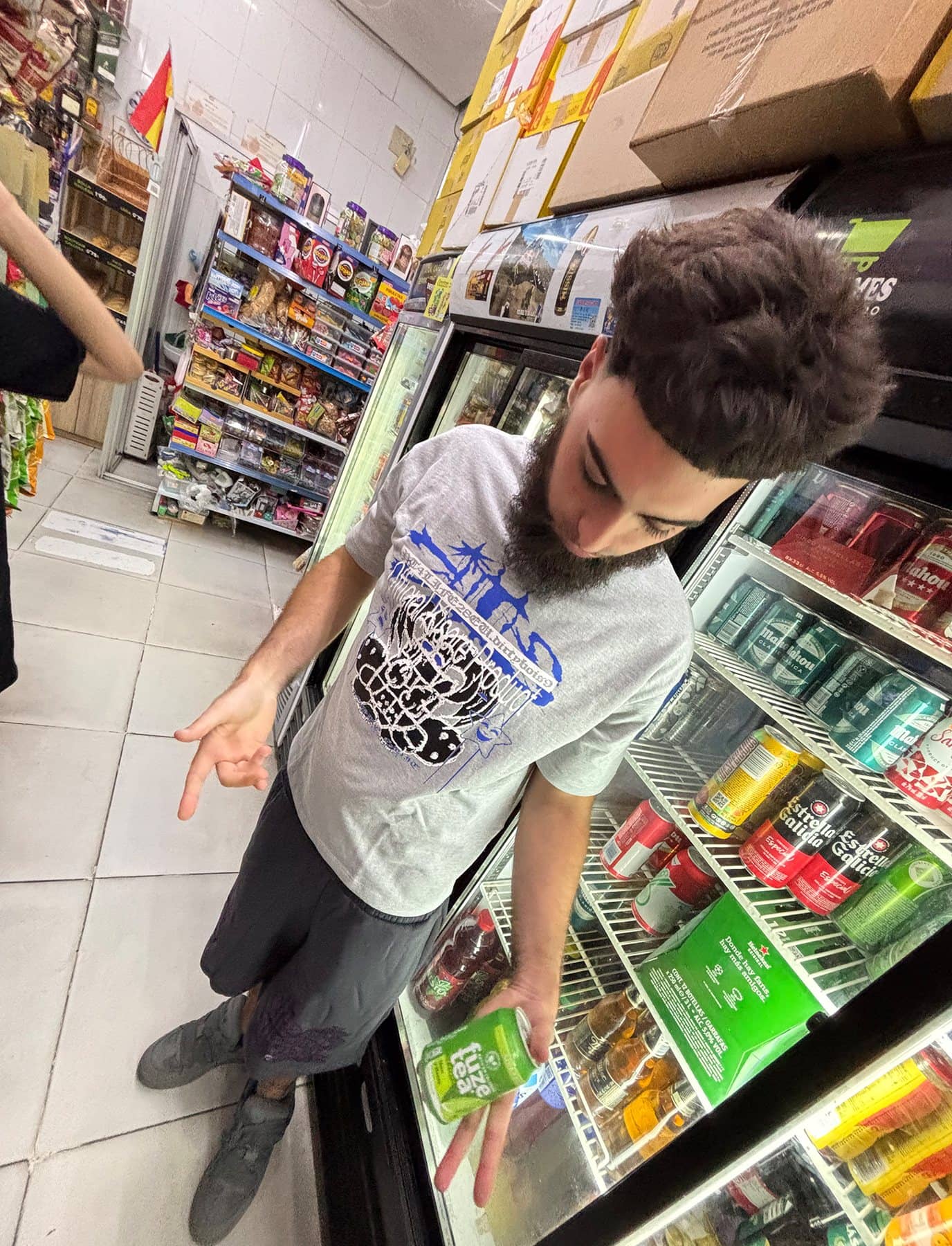PTG Fueled Tee worn in a shop