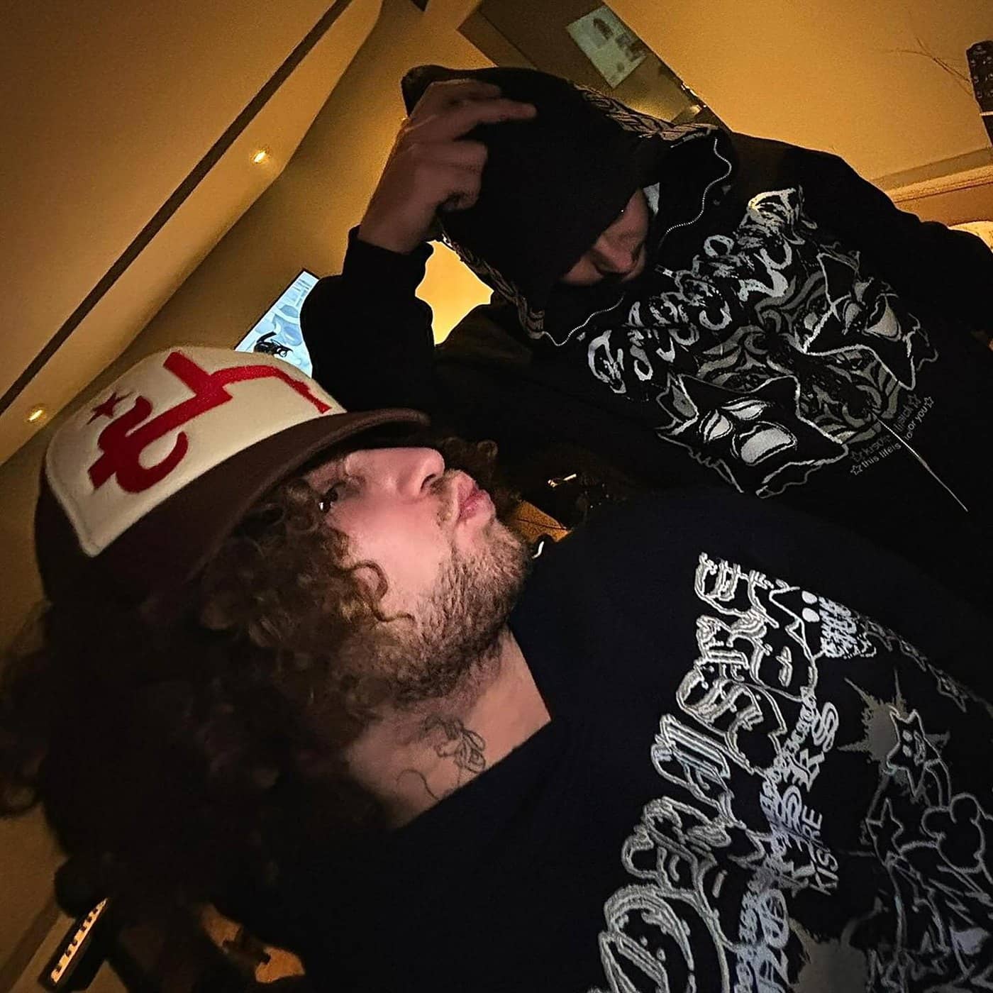 Superreservao and Guxo wearing KISORE